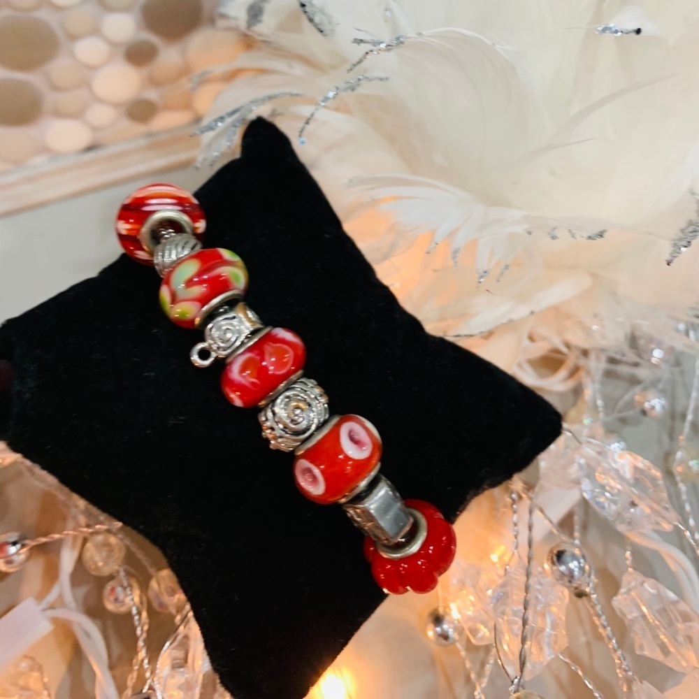 BR16- Charm bracelet with red charms and silver